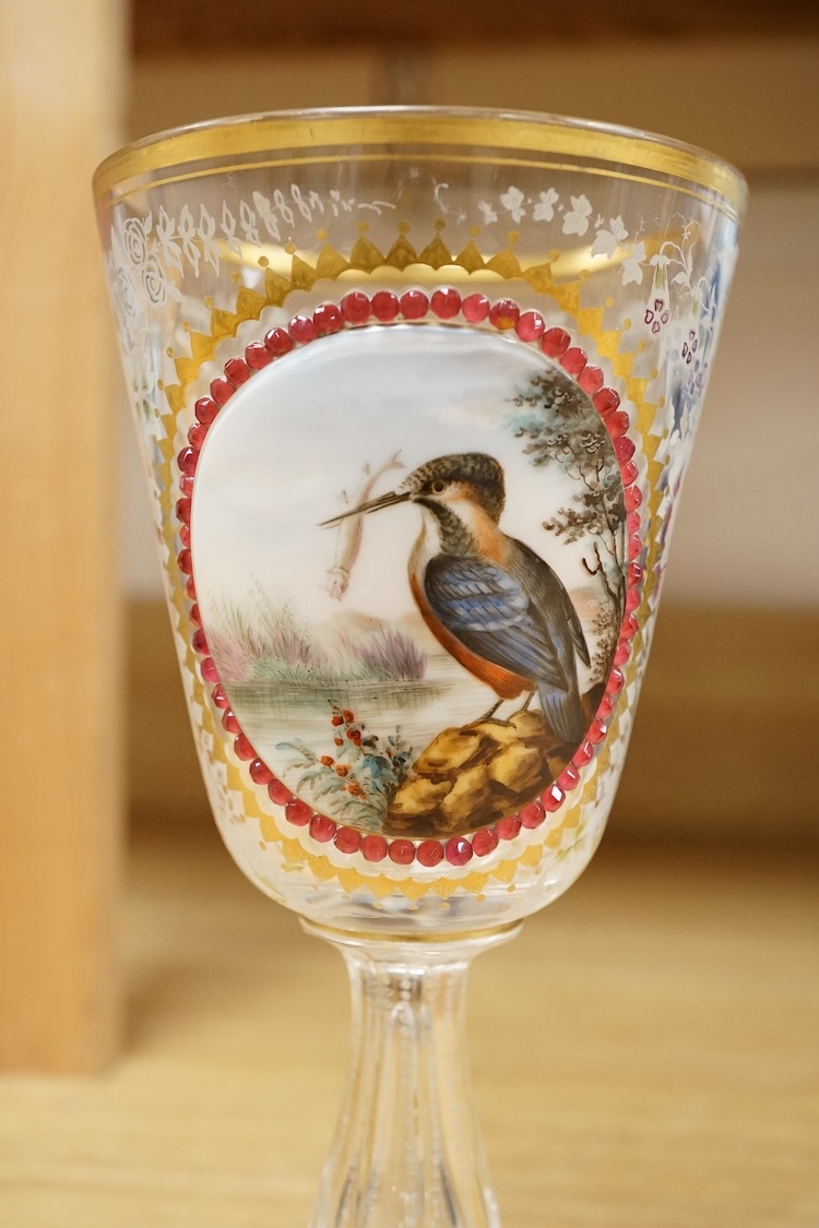 A Bohemian enamelled, overlaid and jewelled goblet, late 19th century, decorated with a Kingfisher grasping a fish, 20cm high